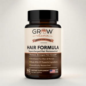 Supplement bottle labeled 'Grow Vitamin Hair Formula' on a light gray background