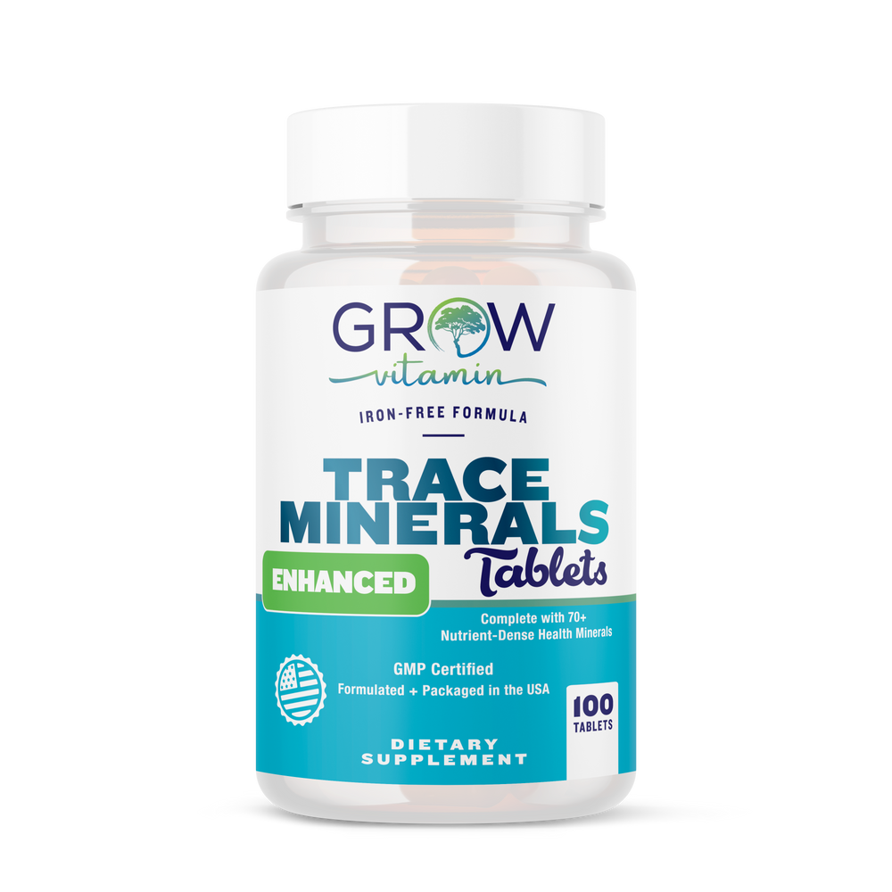 A bottle of Grow Vitamin Trace Minerals Enhanced Tablets, with the label indicating that they are a dietary supplement and have 100 tablets inside.