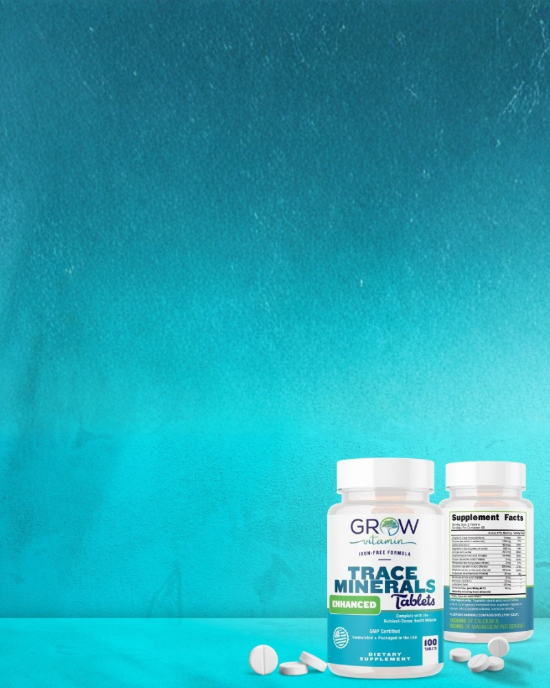 Two white bottles of GROW vitamin Trace Minerals Enhanced dietary supplements with scattered white tablets on a turquoise gradient background.